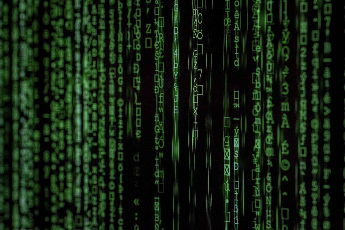 Dark digital visualization of AI malware spreading through a network with glowing red code